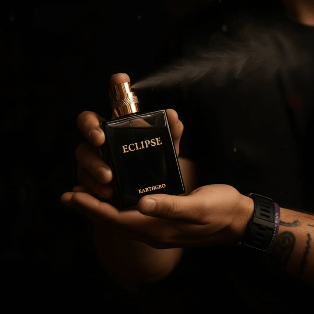 ECLIPSE mens fragrance by Max Millies in a black bottle, being sprayed, showcasing its alluring scent.